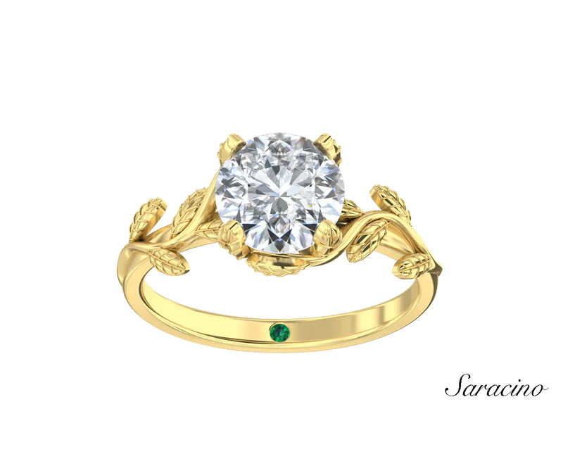 A round brilliant cut diamond ring with a leaf motif